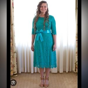 Dainty Jewell’s Night in Paris dress in the teal color.